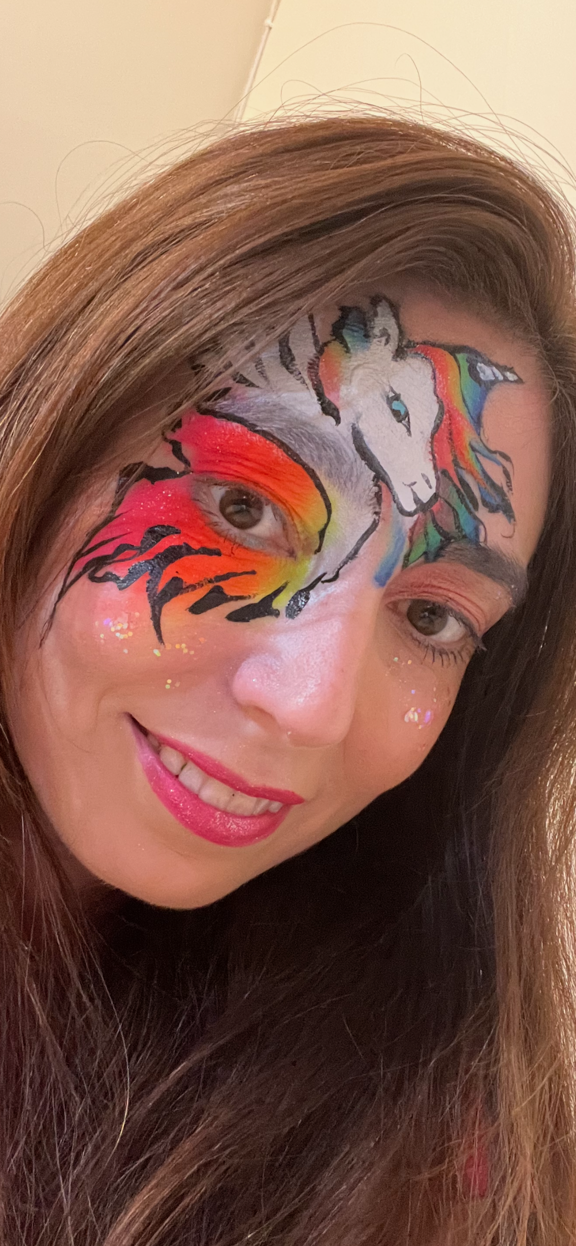 Karina face painting at an event